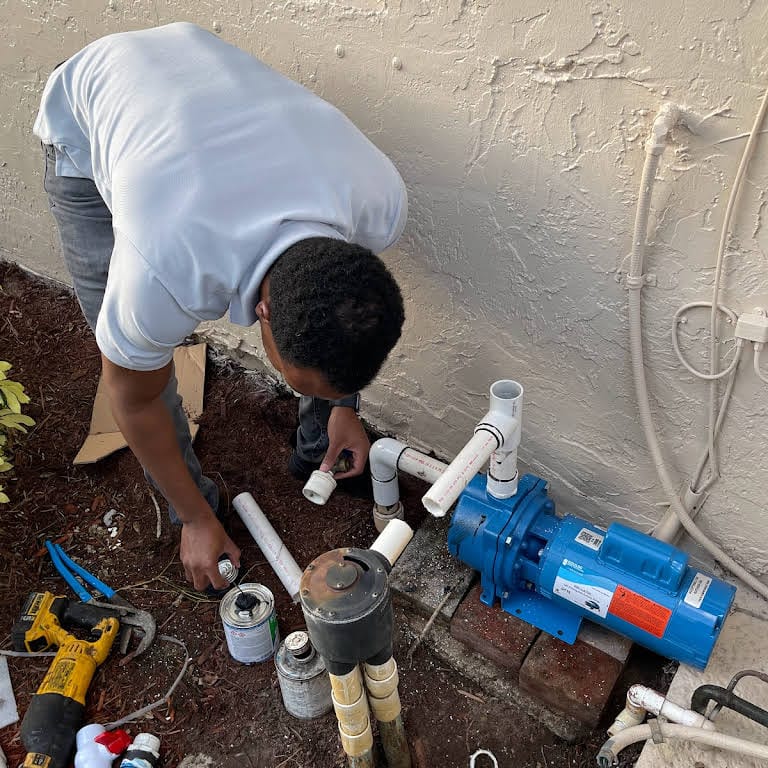 Ben working on a Goulds pump installation